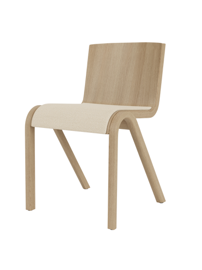 The Ready Dining Chair, featuring a natural oak frame, cantilevered design and a light-coloured Hallingdal upholstered seat.