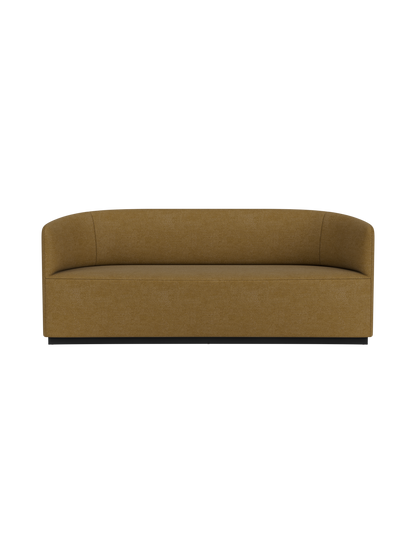 Front view of the Tearoom Sofa, featuring a seamless curved back and upholstered in a golden-brown Audo Bouclé 06 fabric
