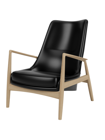 A three-quarter view of The Seal Lounge Chair, High Back, with sleek black leather upholstery and natural oak frame.