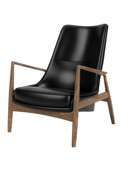 A three-quarter view of The Seal Lounge Chair, High Back, with smooth black leather upholstery and a walnut wood frame.