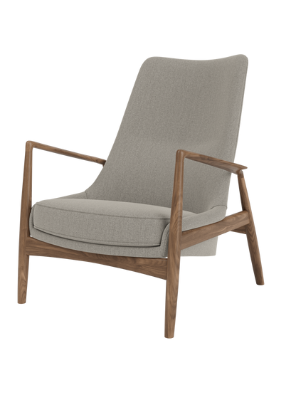 Three-quarter view of The Seal Lounge Chair, High Back, featuring a walnut frame and light grey Re-wool 0218 upholstery.