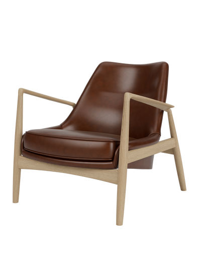 A Seal Lounge Chair, Low Back, with a sculpted natural oak frame and smooth, rich brown Dakar leather upholstery.