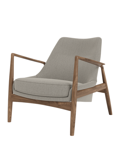 A three-quarter view of The Seal Lounge Chair, Low Back, with a walnut frame and upholstered in a light grey Re-Wool fabric.
