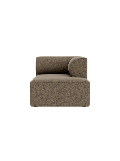 Front view of the Eave Modular Sofa Chaise Longue. The module has a low back and a curved armrest in brown bouclé fabric.