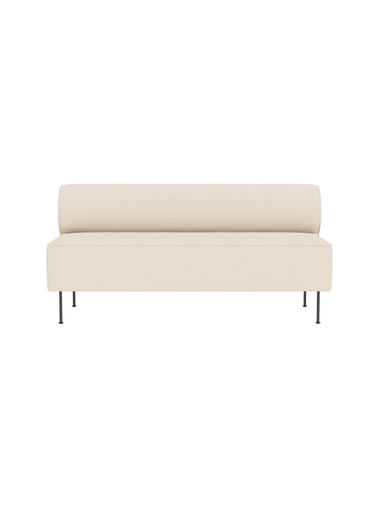 A front-on view of the Eave Dining Sofa in 'Logan Jasmine' fabric, showing its minimalist design and slim metal legs.