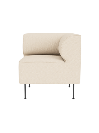 The Eave Dining Sofa, Corner module, upholstered in textured, cream-coloured Logan Jasmine fabric, on slim black metal legs.