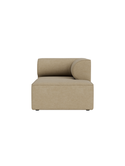 A front-on view of the Eave Modular Sofa Chaise Longue module, upholstered in a light beige Audo Bouclé 02 fabric.