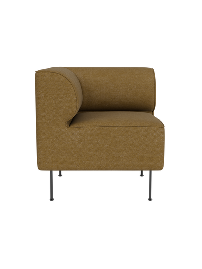 Front view of the Eave Dining Sofa, Corner module, upholstered in mustard-coloured Audo Bouclé 06 on slender metal legs.