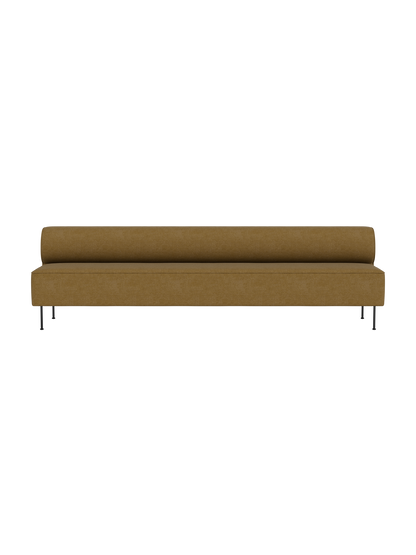 A front view of the long Eave Dining Sofa, upholstered in mustard-yellow Audo Bouclé 06 fabric, with thin black legs.