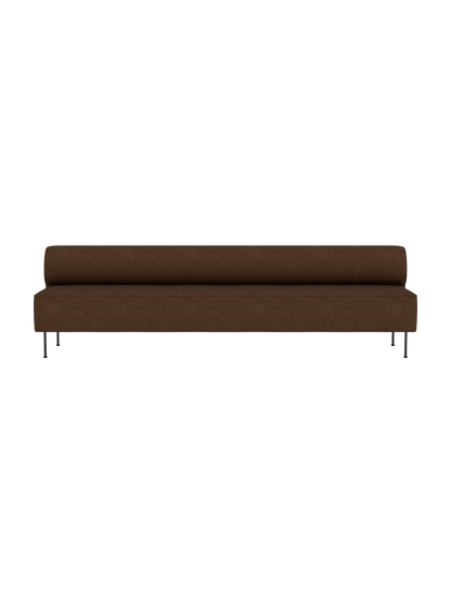 A front-on studio shot of the Eave Dining Sofa upholstered in brown Audo Bouclé 07 fabric, set against a black background.