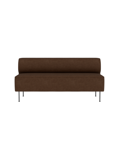 Front view of the Eave Dining Sofa upholstered in brown Audo Bouclé 07 fabric, featuring a low back and slender metal legs.