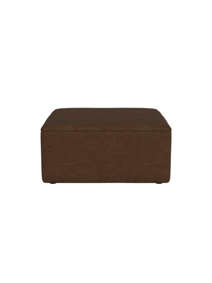 A side view of the square Eave Modular Sofa 86 Pouf, upholstered in a textured, brown Audo Bouclé 07 fabric.
