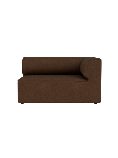 Front view of the Eave Modular Sofa, 86, Corner 129 in Audo Bouclé 07, a textured brown fabric, on a black background.