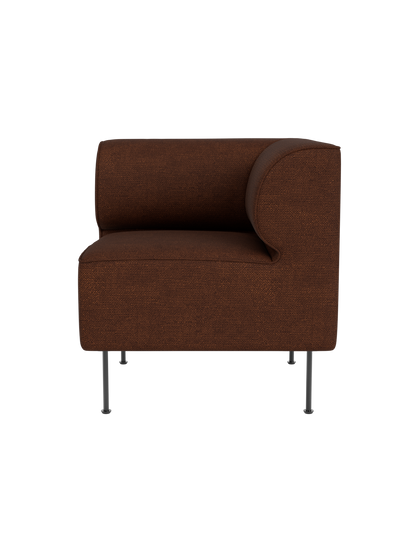 A three-quarter view of the Eave Dining Sofa Corner module in textured brown Audo Bouclé 08 upholstery on slim metal legs.