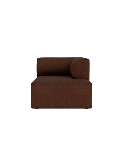A front-facing view of the Eave Modular Sofa Chaise Longue, upholstered in a textured, dark brown Audo Bouclé 08 fabric.