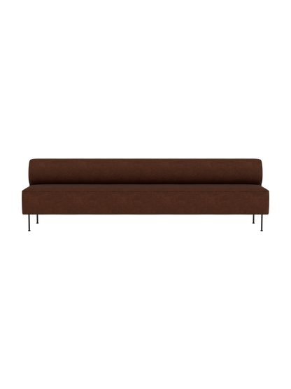 Front view of the Eave Dining Sofa in Audo Bouclé 08. The long, minimalist sofa has a low back and thin black metal legs.