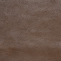 Aida Oeko-Tex upholstery in brown full-grain aniline leather with a soft touch and natural texture.