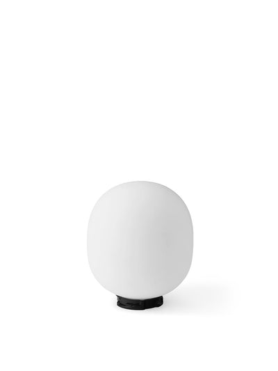 Studio shot of the Glass Shade for JWDA Table Lamp, Portable. A rounded, white opal glass shade on a small black base.