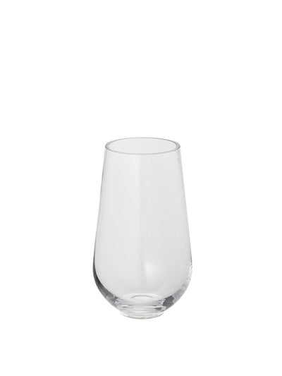A single, clear, stemless glass tumbler with a rounded, weighted base and sides that taper upwards towards the rim.