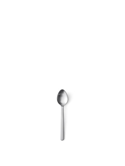 A New Norm Spoon in brushed steel, photographed from directly above against a clean white background.