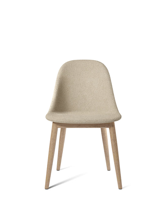 Front view of the Harbour Side Dining Chair with a beige bouclé upholstered seat and natural oak legs on a white background.