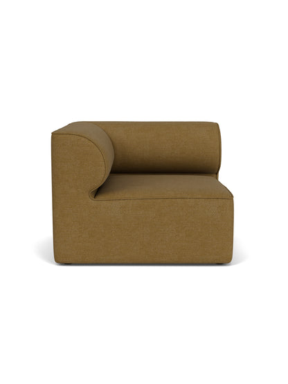 Front view of the Eave Modular Sofa, 96, Corner Left piece, upholstered in a textured, brownish-gold Audo Bouclé 06 fabric.