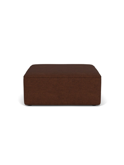 Front view of the Eave Modular Sofa Pouf, 96, upholstered in dark brown Audo Bouclé 08 fabric, on a white background.