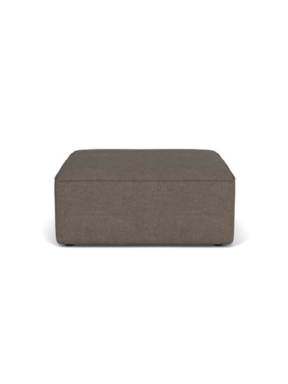 Front view of the Eave Modular Sofa Pouf 96. The square pouf is upholstered in dark, textured bouclé fabric.